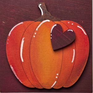 Pumpkin on Maroon Background
